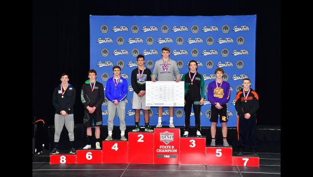 Hugh Groves ... standing on the number 7 step of the champions stage in the 160 weight class at the State Wrestling Tournament in Sioux Falls, SD. Photo courtesy South Dakota Public Broadcasting