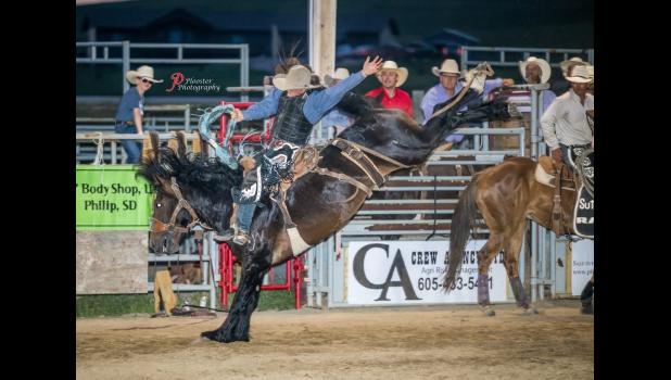 Easton West was crowned champion of the Philip Bronc Match this past Saturday evening. West scored and 89 on Muddy Creek contractor’s Joe Lewis. Plooster Photography