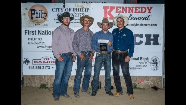 Local cowboys helping with the Philp Bronc Match, with second place winner Ty Manke. Pictured (l to r) Dylan Schofield, Cooper West, Easton West, and Jacob Kammerer. Plooster Photography