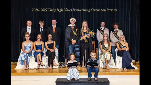 PHS 2026-2027 Homecoming Royalty - Back row (standing l to r): Owen Harty, Xander Harry, Brodie Puhlman, King Stetson Jones, Queen Paige O’Connor, Randen Wishard, Oakley Menzel. Front row, sitting: Millie Clark-Carley, Maysa Jones, Mesa Mangis, crown bearers - Hazel Kjerstad and Conlee Schofield, Kale Peterson, Kaydence Eisenbraun. PHS Homecoming Royalty Court