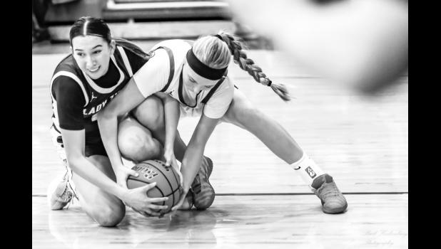 Sunny Valburg fights for ball rights. Photo Barb Hockenbary Photography