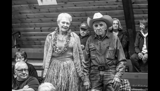 Ellen and Bill Valburg. The theme for Tuesday night’s game was Hawaiian. Photo Barb Hockenbary Photography
