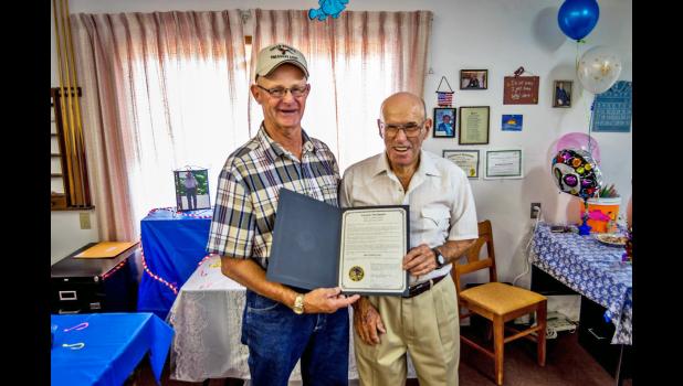 Butch Feddersen presents Bob Totton with the Governor’s Proclamation designating August 4, 2016 as “Bob Totton Day.”