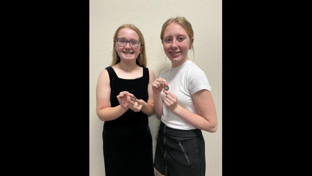 Channing Reiff and Lila Besler with their medals they received at Districts. These young ladies have now advanced to STATE.