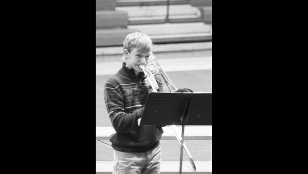 Jesse Shoon on trombone with a solo prelude. Photo by Mishayla Buchannan