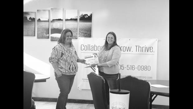 Krysti Barnes accepts the Friend of Economic Development Award given to the City of Murdo. Photo by Mishayla Buchannan