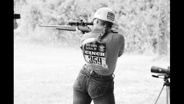 Grace Gesinger aims for victory. Photo by Jennings Photography