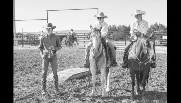 Seniors Jacob Roghair, Jubilee Roghair, and Grace Gesinger win ribbons. Grace won was the Grand Champion of the Senior Showmanship division! Photo by Cristen Joy Photography