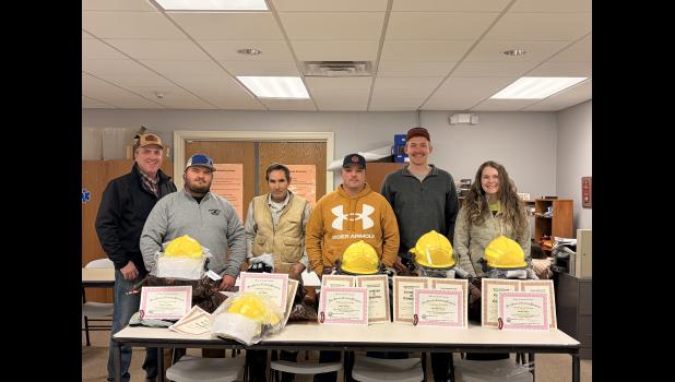 Certified Firefighters ... with their protective gear and certificates of completion. Pictured L to R: Scott Gray, FVFD Training Officer, Glenn Palmer, Joe Taylor, Brian Totten, Jade Mortenson and Lenae Hulm. Courtesy Photo