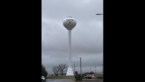 New Water Tower ... white painted exterior including an orange FHS Longhorn logo. Images of the interior include a view of the mechanics and ladder. There are 187 ladder rungs to get to the top, the tank holds 250,000 gallons, it took 4 days to fill and it has an automatic mixer so the water is always moving. Photos courtesy Jon Collins
