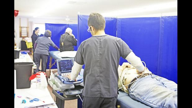 Dan Hight in the process of an abdominal aeortic aneurism screening.