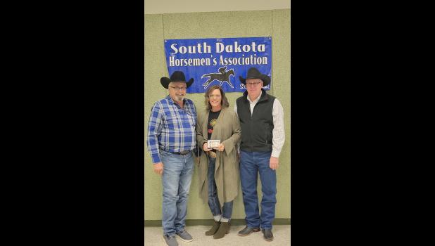 Out of State Leading Money Earner, Three Year Old, Hasta Be Tickled, Owner John Johnson, Trainer Bob Johnson, Sponsor Southwest Grain. Pictured Bob and Shilo Johnson and Mike Lemburg President SDQHRA.