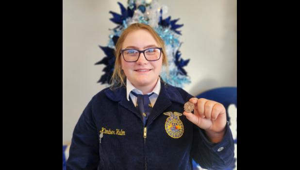 Kimber Hulm with her Bronze Medal.