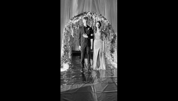 Addison Rankin, escorted by Deacon Haerer Photo by Mishayla Buchannan