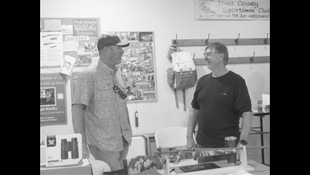 Seth Geigle and Ron Olsen were giving away Viper binoculars and a hunting rifle.