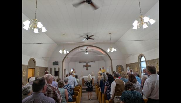 Faithful parishioners celebrate the 100th dedication of St. Mary’s Church. Courtesy Photo