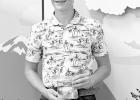 Jesse Schoon received a trophy for placing first in the speech category. Photo’s courtesy of Lealand Schoon